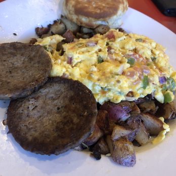 The Egg Bistro - Dig In Breakfast bowl. Eggs, peppers, onion, tomato and cheese on home fries with sausage and a biscuit. - Breakfast & Brunch Near Me - Chesapeake, Virginia