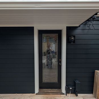 Advanced Home Repairs - Back door with new siding and repainted awning - General Contractors Near Me - Marysville, Washington Advanced Home Repairs - Back door with new siding and repainted awning - General Contractors Near Me - Marysville, Washington