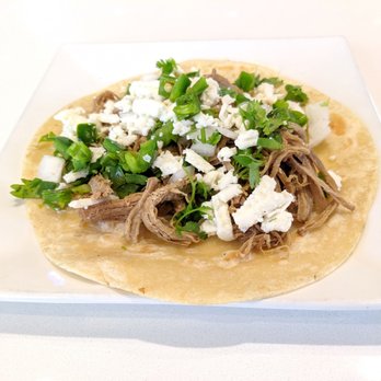 El Taquito - Taco Deshebrada, Queso Fresco, Cilantro, Onion on a  Flour Tortilla - Mexican Near Me - Pflugerville, Texas