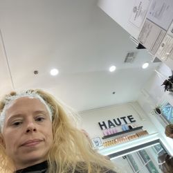 Haute European Salon & Beauty Products - Hair in chair getting done