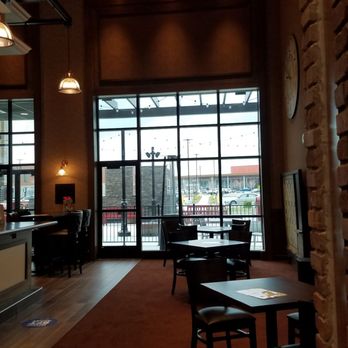 Movie Tavern - Brookfield Square - Bar area (to the right is a magnetic scrabble board on the wall). They had big screen TVs and a good selection of local and domestic taps. - Cinema Near Me - Brookfield, Wisconsin Movie Tavern - Brookfield Square - Bar area (to the right is a magnetic scrabble board on the wall). They had big screen TVs and a good selection of local and domestic taps. - Cinema Near Me - Brookfield, Wisconsin