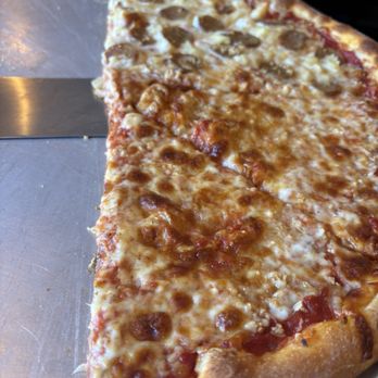 Rocky's Pizzeria and Restaurant - X-Large 18" half sausage and pineapple half cheese and garlic! - Pizza Near Me - Flagler Beach, Florida Rocky's Pizzeria and Restaurant - X-Large 18" half sausage and pineapple half cheese and garlic! - Pizza Near Me - Flagler Beach, Florida