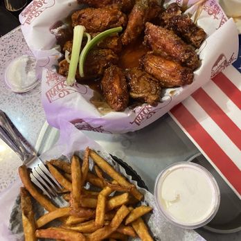 Track One - Half order of fries and 10 piece wings. Half spicy lemon pepper and half double dip. - American Near Me - El Paso, Texas Track One - Half order of fries and 10 piece wings. Half spicy lemon pepper and half double dip. - American Near Me - El Paso, Texas