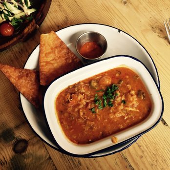Oxford Blue - Gumbo - chicken, spicy sausage etc. Nacho on the side with hot sauce. VERY spicy tho! - Pubs Near Me - Oxford, OXF Oxford Blue - Gumbo - chicken, spicy sausage etc. Nacho on the side with hot sauce. VERY spicy tho! - Pubs Near Me - Oxford, OXF