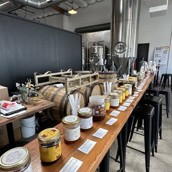 Meadiocrity Mead - a long table with jars of honeys and jars of jams - Meaderies Near Me - San Marcos, California Meadiocrity Mead - a long table with jars of honeys and jars of jams - Meaderies Near Me - San Marcos, California