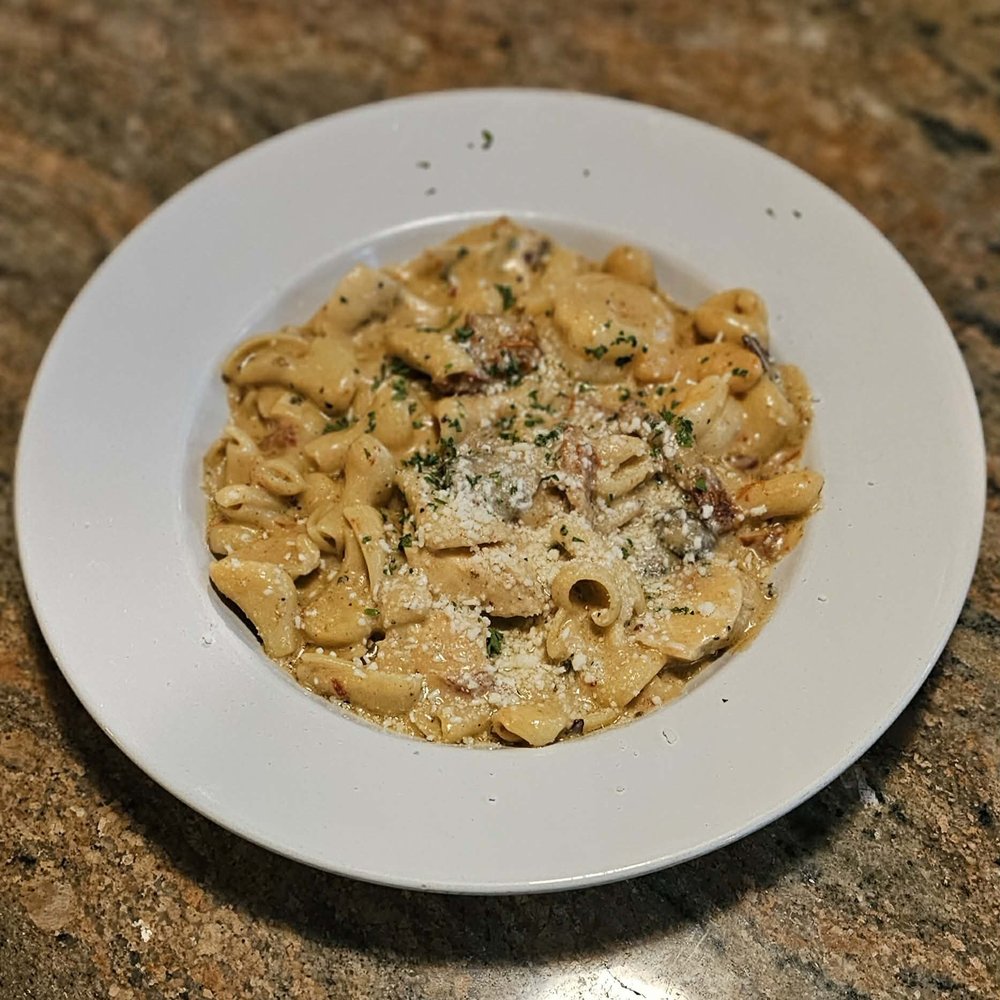 Tromba rustica  Shrimp  chicke and pasta delectable!