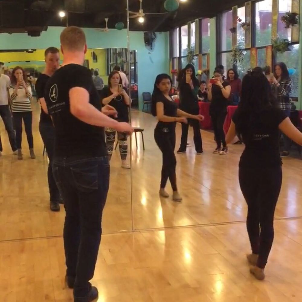 Latin Expressions Dance Company - Kyle and Mara demonstrating at the steps at the end of class! - Dance Studios Near Me - Indianapolis, Indiana Latin Expressions Dance Company - Kyle and Mara demonstrating at the steps at the end of class! - Dance Studios Near Me - Indianapolis, Indiana