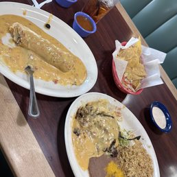 Chimichanga on the left Chile Riano on the right the salsa came straight from a can. Both of them one was merely tomato sauce. Chimichanga on the left Chile Riano on the right the salsa came straight from a can. Both of them one was merely tomato sauce.