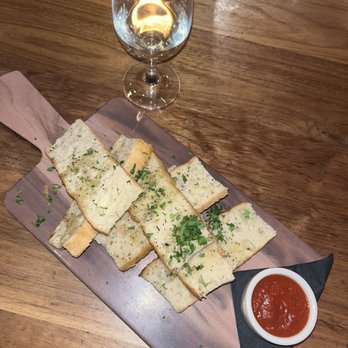 VIVO Italian Kitchen - Bread board with maranta - Italian Near Me - Universal City, California VIVO Italian Kitchen - Bread board with maranta - Italian Near Me - Universal City, California