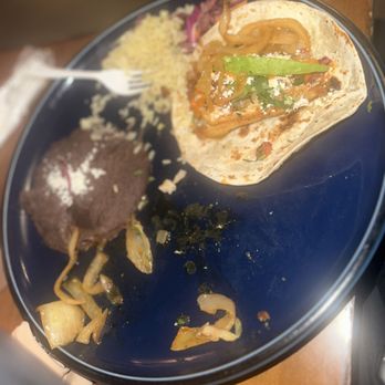 Petra - He had the chicken Mexican taco as you can see I couldn't even get a photo lol - Mexican Near Me - McKinney, Texas