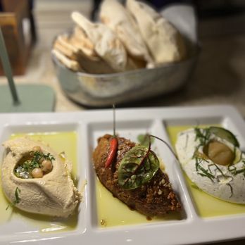 Amal - Sampler: Hummus* Garlic Labneh* Muhammara - Lebanese Near Me - Miami, Florida Amal - Sampler: Hummus* Garlic Labneh* Muhammara - Lebanese Near Me - Miami, Florida