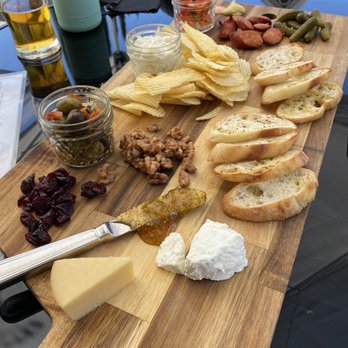 The Vine - Charcuterie & Cheese Board w/ purple haze (lavender & fennel goat cheese, bourbon gouda, and andouille sausage ~ $23 - Wine Bars Near Me - Folsom, California The Vine - Charcuterie & Cheese Board w/ purple haze (lavender & fennel goat cheese, bourbon gouda, and andouille sausage ~ $23 - Wine Bars Near Me - Folsom, California