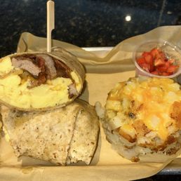 Breakfast burrito with cheesy potato hash Breakfast burrito with cheesy potato hash