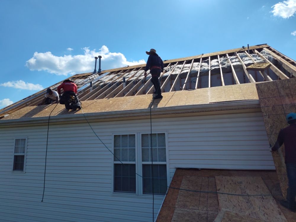 Slide of Two Son Roofing