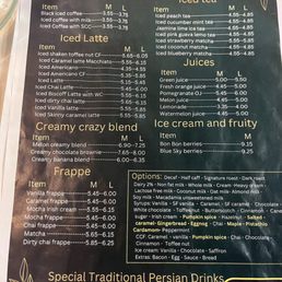 Menu - Menu featuring cold beverages such as iced coffee, iced latte, iced tea, juices, ice cream, and traditional Persian drinks with prices and options.