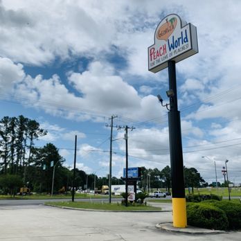 Georgia Peach World - Sign you see from US-17. - Specialty Food Near Me - Richmond Hill, Georgia Georgia Peach World - Sign you see from US-17. - Specialty Food Near Me - Richmond Hill, Georgia