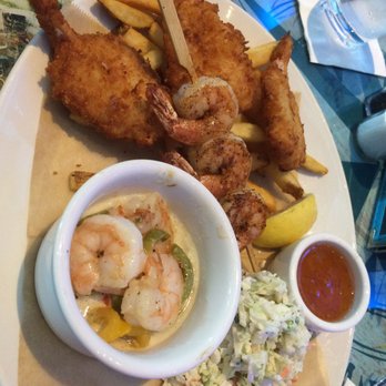 Margaritaville - The shrimp trio. It was $24.99. A good amount of food for one person. Shrimp was tasty and fries were good. - Bars Near Me - Tulsa, Oklahoma Margaritaville - The shrimp trio. It was $24.99. A good amount of food for one person. Shrimp was tasty and fries were good. - Bars Near Me - Tulsa, Oklahoma