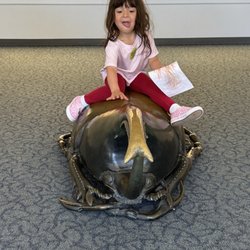 San Diego Natural History Museum - Toddler on a beetle The Nat exhitbit