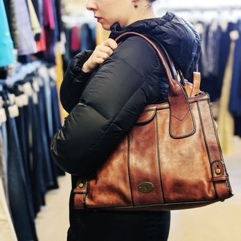 Re-Couture Boutique - Trying on a cute bag found in the clearance section! - Used, Vintage & Consignment Near Me - Bozeman, Montana Re-Couture Boutique - Trying on a cute bag found in the clearance section! - Used, Vintage & Consignment Near Me - Bozeman, Montana