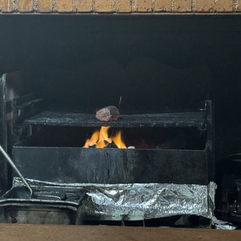 Antiquity Restaurant - Chateaubriand cooking over an open fire. - Seafood Near Me - Albuquerque, New Mexico