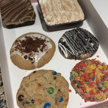 Crumbl - Mt. Laurel - Sample box including 4 cookies, a Dubai brownie and tres leches cake. - Bakeries Near Me - Mt Laurel Township, New Jersey