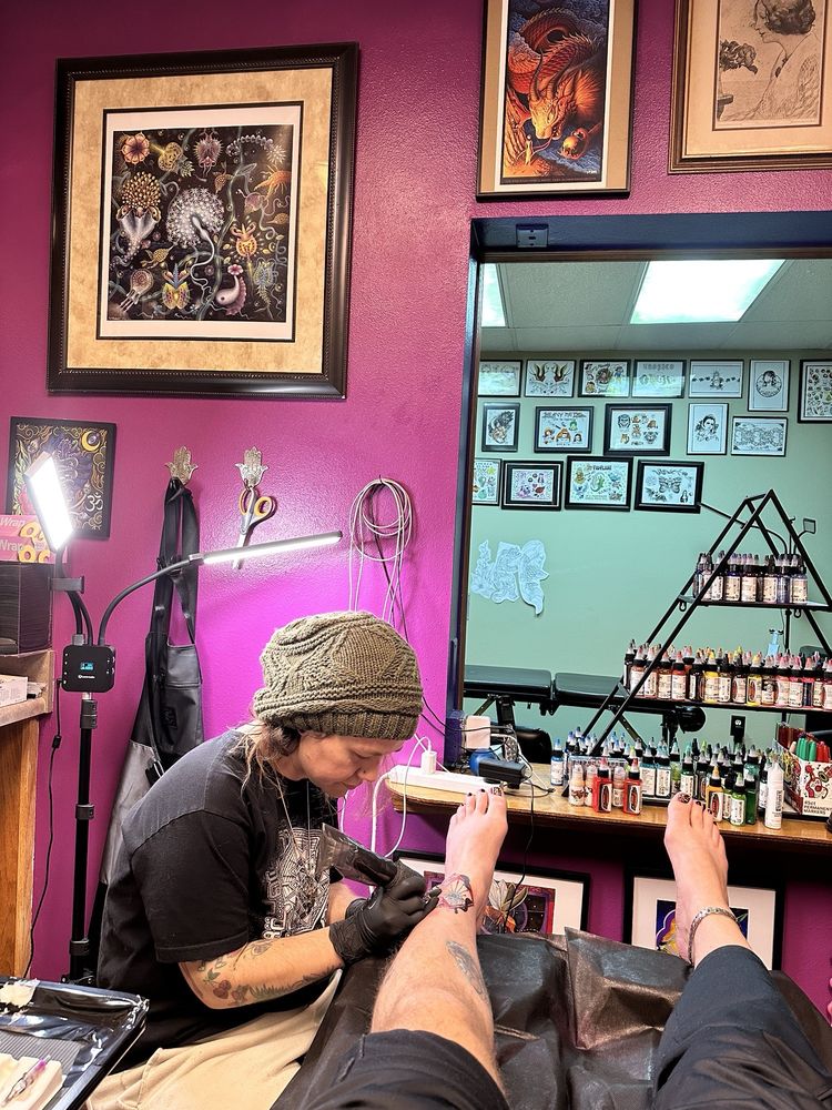 Alien Phone Tattoo Logo