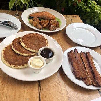 Cafe Katja - Blueberry pancakes, a tad too dry bacon (but it's bacon so yum:) and perfectly cooked salmon (medium) with deliciously crips potato's. - German Near Me - New York, New York Cafe Katja - Blueberry pancakes, a tad too dry bacon (but it's bacon so yum:) and perfectly cooked salmon (medium) with deliciously crips potato's. - German Near Me - New York, New York