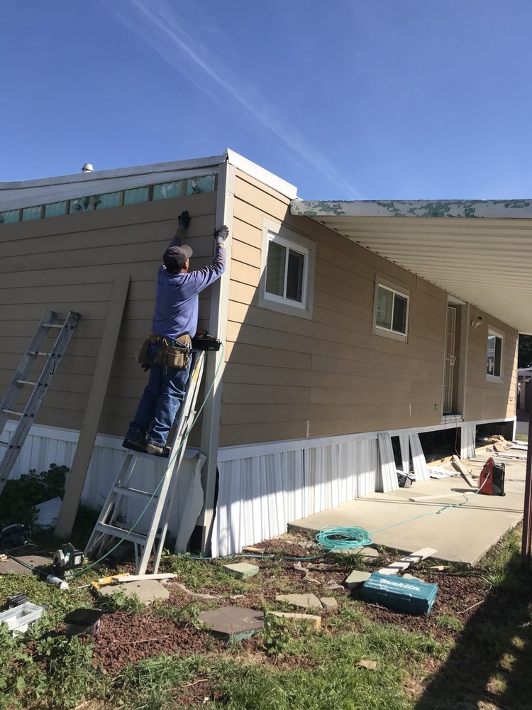 Slide of Oscar Construction DBA Roofing