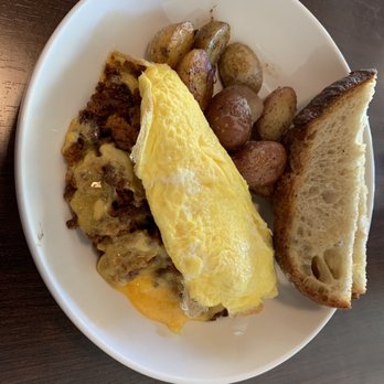Our Nest - Chorizo omelette with Our roasted potatoes and sourdough toast. - Breakfast & Brunch Near Me - Fullerton, California Our Nest - Chorizo omelette with Our roasted potatoes and sourdough toast. - Breakfast & Brunch Near Me - Fullerton, California