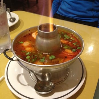 Thai Flavor - large tom-yum soup! The bowl isn't well insulated so after the fire goes out the soup cools quickly. spicy, tangy and delicious! - Thai Near Me - Aurora, Colorado Thai Flavor - large tom-yum soup! The bowl isn't well insulated so after the fire goes out the soup cools quickly. spicy, tangy and delicious! - Thai Near Me - Aurora, Colorado