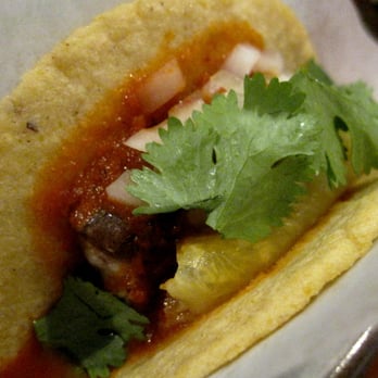 Oyamel - Pancita de puerco al pastor - Seared house cured pork belly in a sauce of tomatoes and guajillo chiles, with pineapple - $4 - Mexican Near Me - Washington, DC, District of Columbia Oyamel - Pancita de puerco al pastor - Seared house cured pork belly in a sauce of tomatoes and guajillo chiles, with pineapple - $4 - Mexican Near Me - Washington, DC, District of Columbia