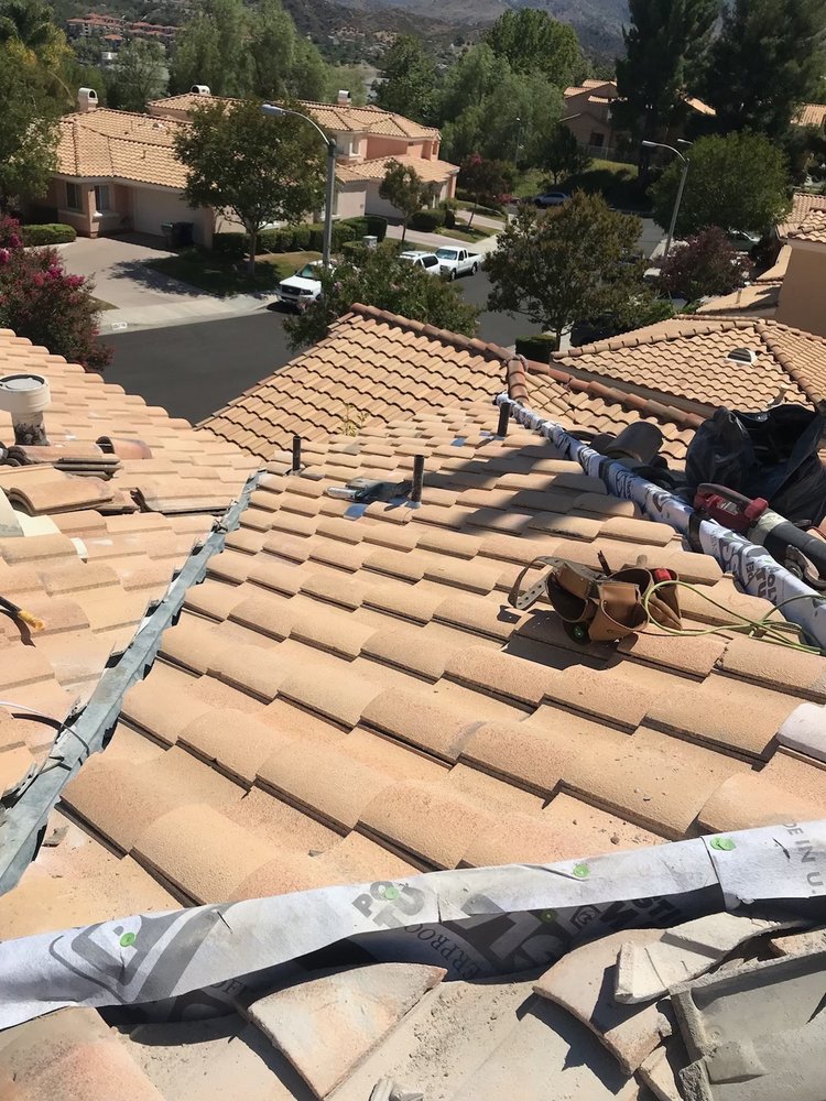 Slide of Imperial Roofing