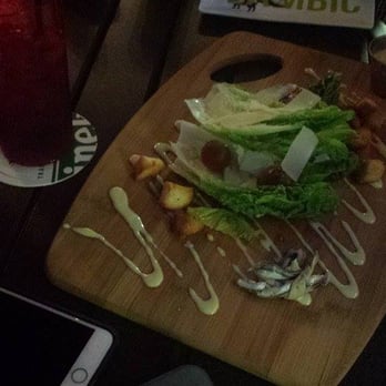 Taps & Apps - This is the Cesar salad, the plating is beautiful but the amount for the price was a little high for us. - New American Near Me - Mililani, Hawaii
