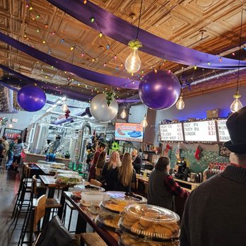 Manhattan Brewing Company - people sitting at tables in a restaurant - Breweries Near Me - Manhattan, Kansas