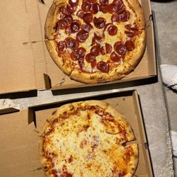 The Whistle Stop and Stone Oven Pizzeria - Large Cheese and Large Pepperoni pizza