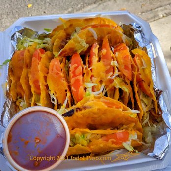 Happy Burger - a tray of tacos with sauce - Burgers Near Me - El Paso, Texas