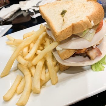Keke's Breakfast Cafe - Turkey Club (added over easy egg) - Breakfast & Brunch Near Me - Windermere, Florida Keke's Breakfast Cafe - Turkey Club (added over easy egg) - Breakfast & Brunch Near Me - Windermere, Florida