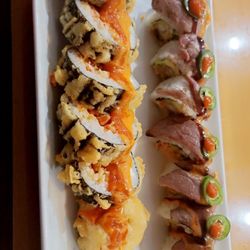 Crawfish popcorn and egg rolls for appetizer King Kong sushi roll and Texas Roll It all was so delicious, definitely a must try.