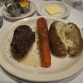 Bob's Steak & Chop House - Louisville - The 12 ounce Fillet with the Glazed Carrot and the Baked Potato. Note the baked potato fixings in the background - Steakhouses Near Me - Louisville, Kentucky Bob's Steak & Chop House - Louisville - The 12 ounce Fillet with the Glazed Carrot and the Baked Potato. Note the baked potato fixings in the background - Steakhouses Near Me - Louisville, Kentucky