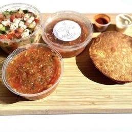 a variety of food items on a cutting board