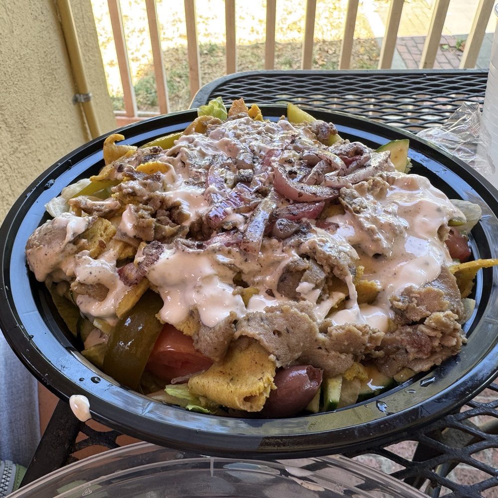 Sam's Cuisine - Big generic bowl of lettuce, mushy tomatoes and processed pasty "lamb" and "chicken" - awful - Mediterranean Near Me - Davis, California Sam's Cuisine - Big generic bowl of lettuce, mushy tomatoes and processed pasty "lamb" and "chicken" - awful - Mediterranean Near Me - Davis, California