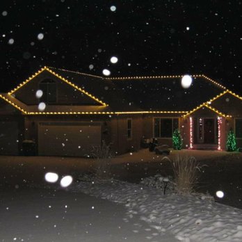 Freedom Sprinklers - a house in the snow - Irrigation Near Me
