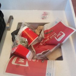 Overflowing trash can. They were both like this one.