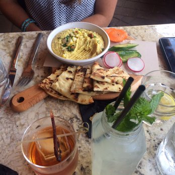 Great Maple - Charred cauliflower hummus accompanied by "maple bacon old fashioned" and "don't be dole" cocktails. - New American Near Me - Newport Beach, California