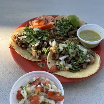 La Pupusa Loca - a plate of tacos and a bowl of salsa - Food Trucks Near Me - San Jose, California La Pupusa Loca - a plate of tacos and a bowl of salsa - Food Trucks Near Me - San Jose, California