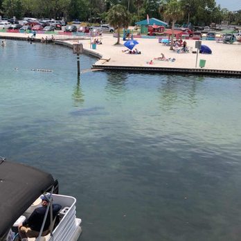 Upper Deck - Mommy and baby in middle of picture. - Sports Bars Near Me - Weeki Wachee, Florida