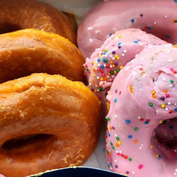 Round Rock Donuts - Glaze donuts  and pink sprinkle glaze. - Donuts Near Me - Cedar Park, Texas