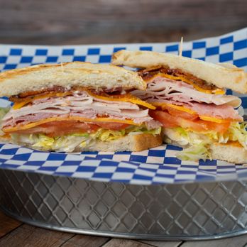 Machado Burgers - Our delicious Turkey Club on sliced locally baked sourdough bread. - Burgers Near Me - Windsor, California Machado Burgers - Our delicious Turkey Club on sliced locally baked sourdough bread. - Burgers Near Me - Windsor, California
