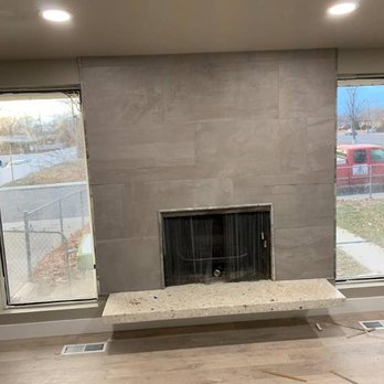 Suncrest Home Builders - a fireplace in the living room - General Contractors Near Me Suncrest Home Builders - a fireplace in the living room - General Contractors Near Me