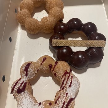 Mochinut - Cinnamon sugar, Nutella, raspberry drizzle- this box was $10, more expensive than many other mochi doughnuts in the area. - Donuts Near Me - Bloomington, Minnesota